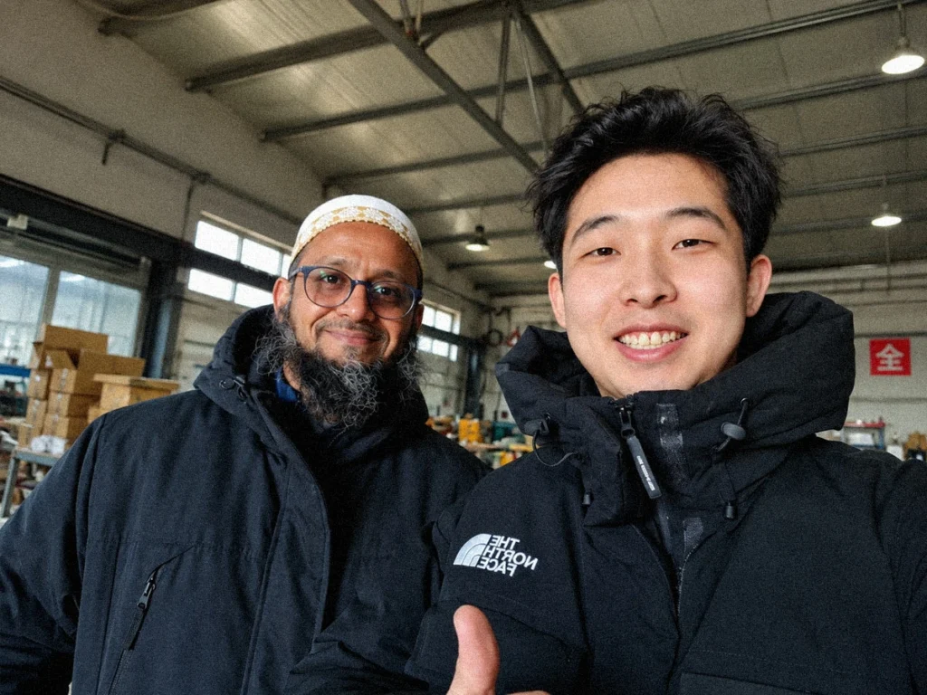 Our team and three visiting customers at the factory.